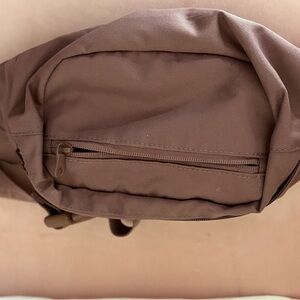 MauveBelt Bag with Curved Shape and Smooth Material